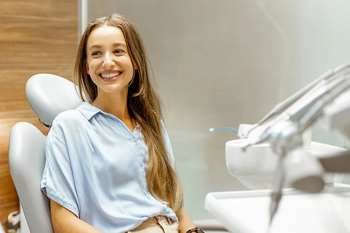 Smiling patient seated in a dental chair during a general dentistry visit at Vinings Modern Dentistry