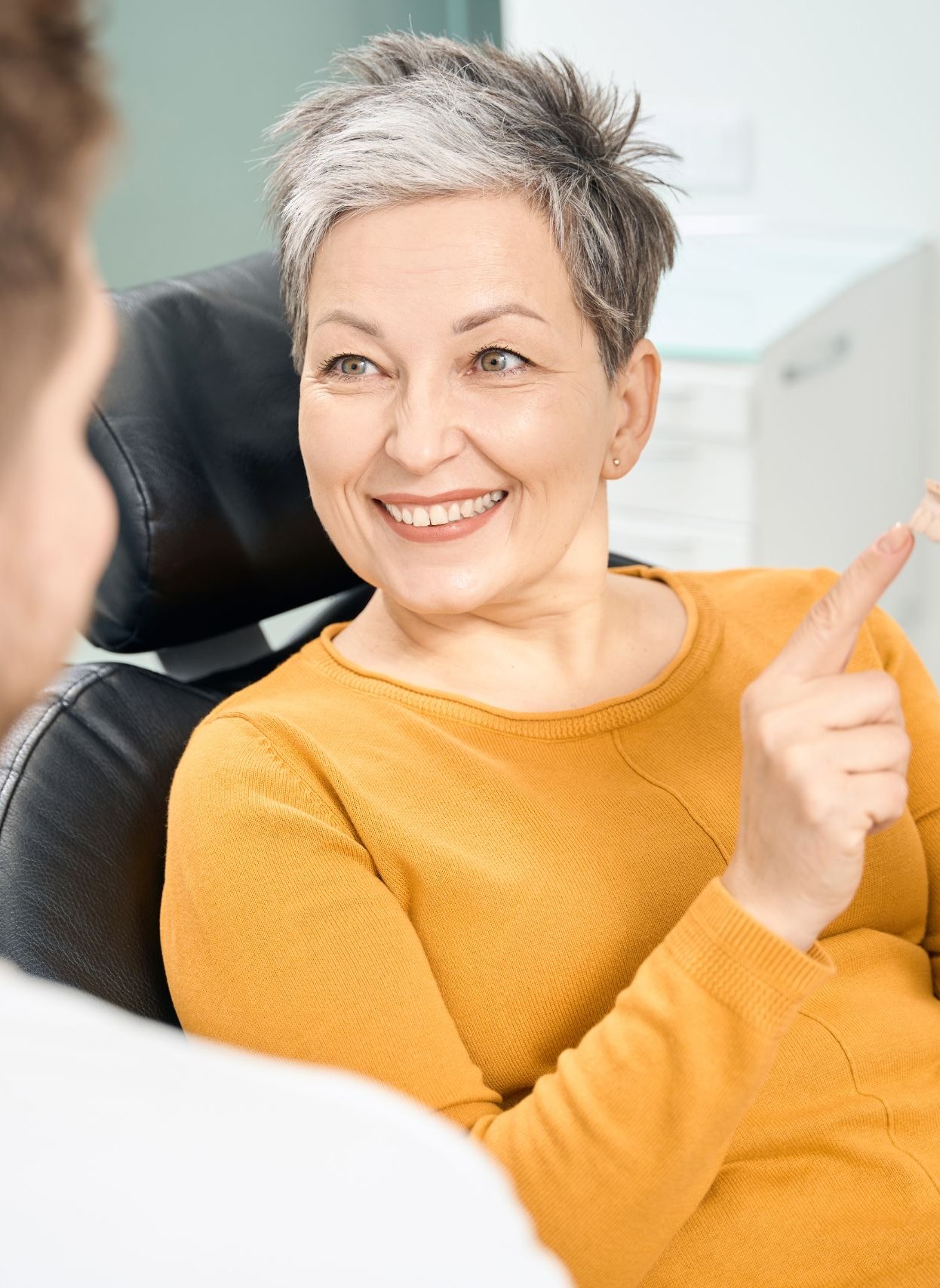Patient reviewing smile makeover options during a dental consultation